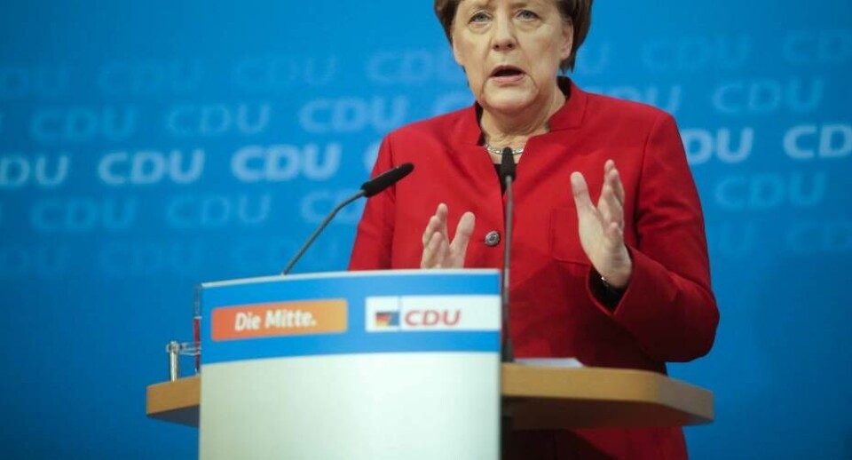Merkel melder klar til at lede Tyskland gennem utryg tid