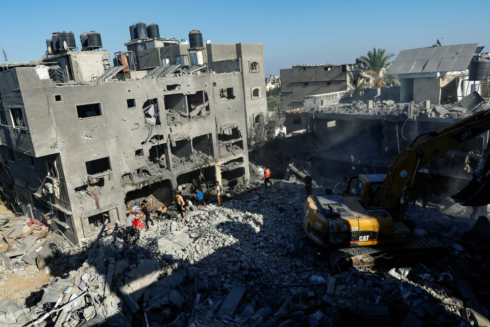 ødelagt efter israelske flyangreb i . Ezzedine al-Qassam, Hamas' militære gren, siger, at 13 tilfangetagne israelere og udlændinge er dræbt under de israelske bombeangreb.