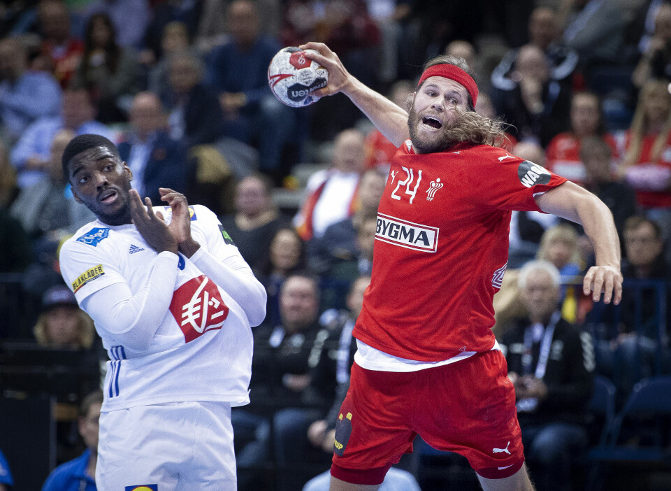 Mikkel Hansen og Dika Mem under semifinalen mellem Danmark og Frankrig VM i håndbold